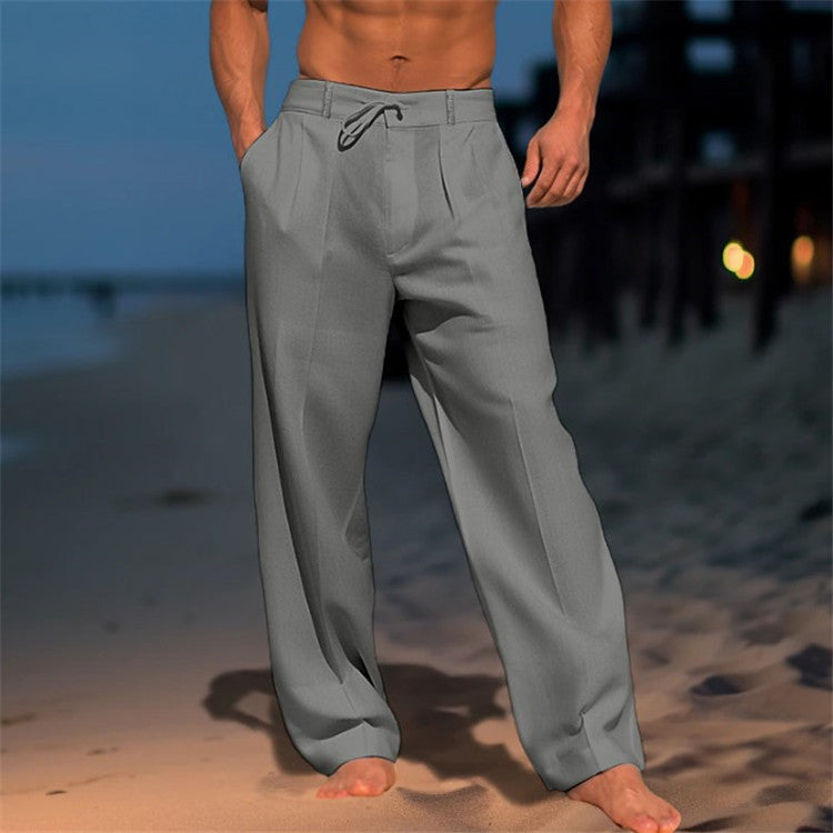 Comfortable men's relaxed fit drawstring pants made from lightweight fabric for spring fashion.