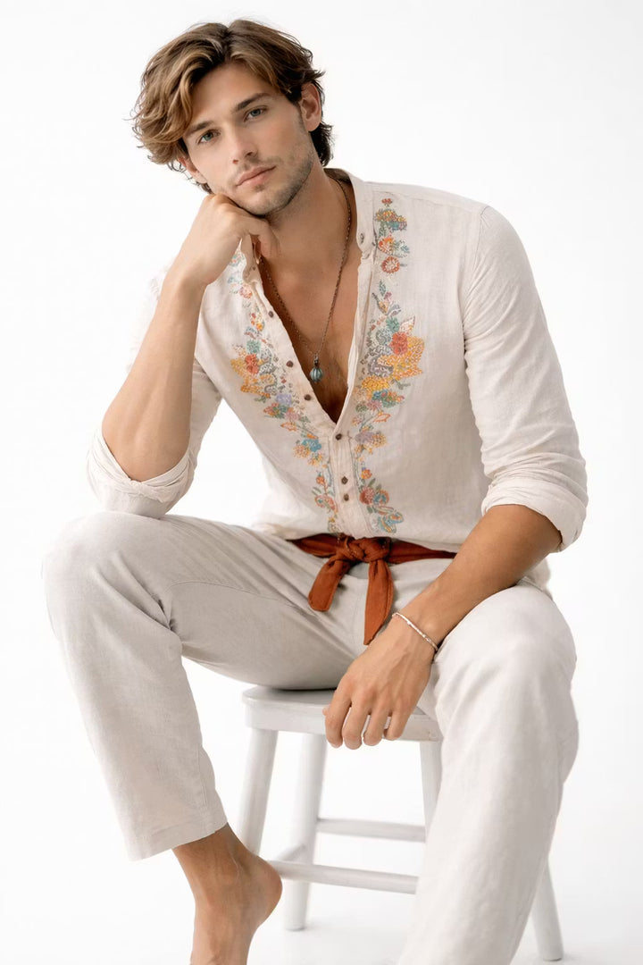 Stylish men's long sleeve shirt featuring delicate floral embroidery and a comfortable relaxed fit.