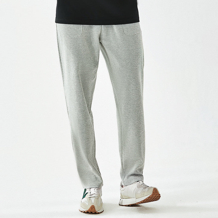 Men's relaxed fit joggers for ultimate comfort, ideal for casual and everyday wear. Features drawstring.