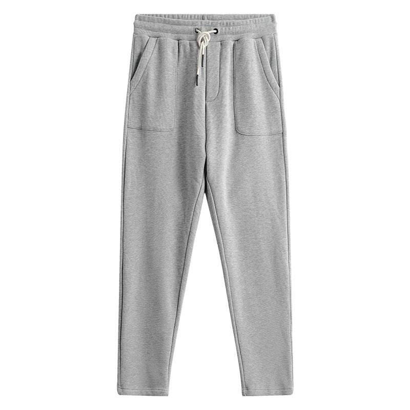 Stylish men's relaxed fit joggers with a straight leg and comfortable drawstring waist for a modern look.