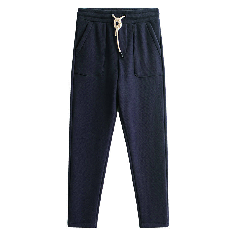 Men's relaxed fit joggers featuring a comfortable drawstring waist, deep pockets, and a straight leg design.