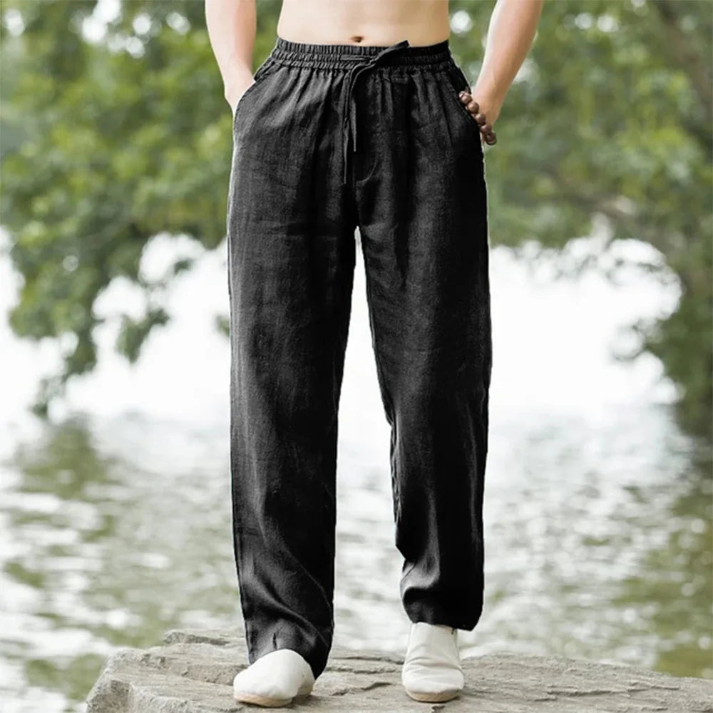 White men's relaxed fit linen drawstring pants, great for beachwear or travel
