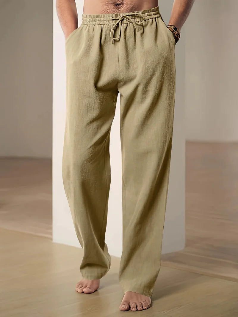 Men's apparel: relaxed fit linen blend drawstring pants, essential for warm weather and travel fashion.