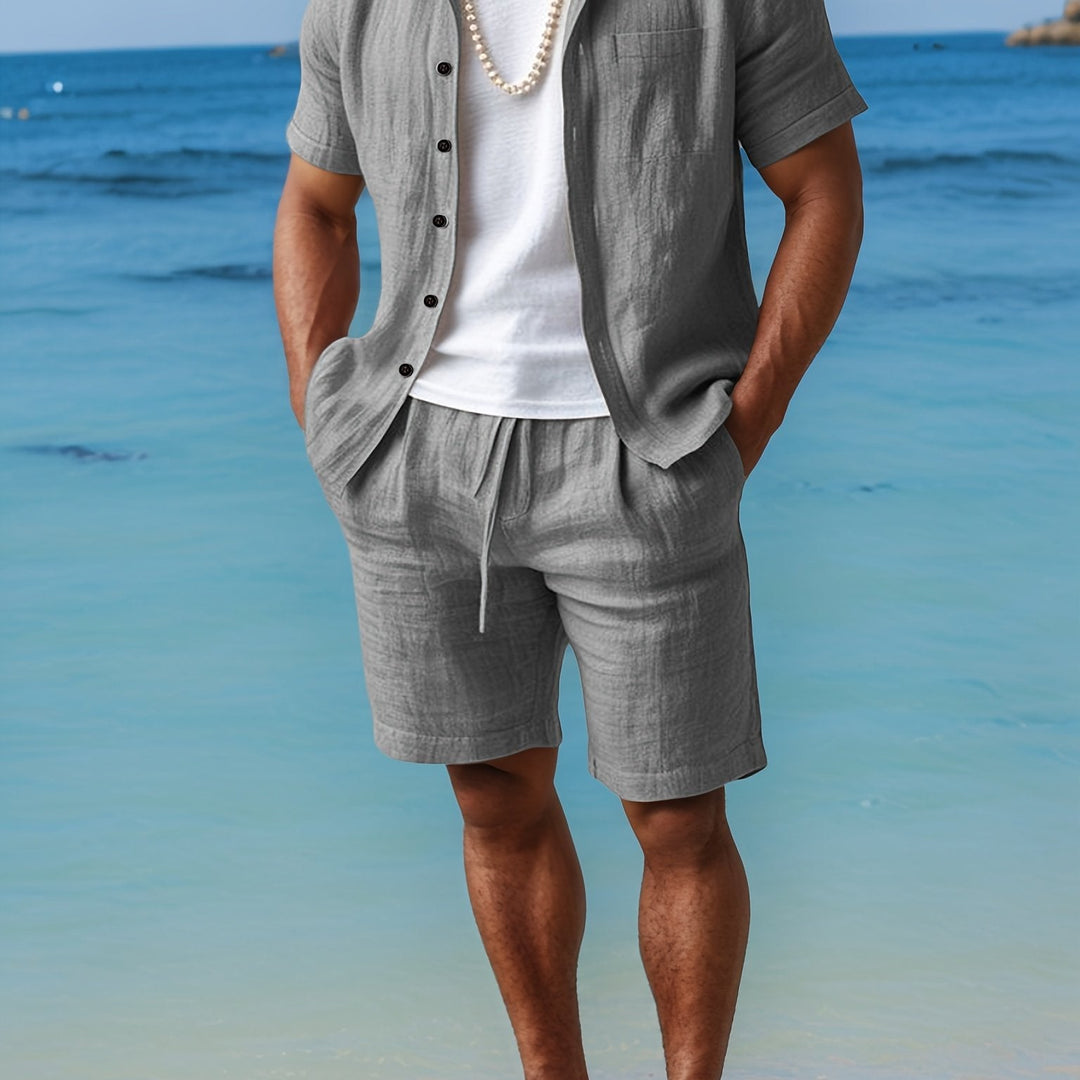 Casual men's linen set: relaxed fit button shirt and comfortable shorts, great for vacation style.