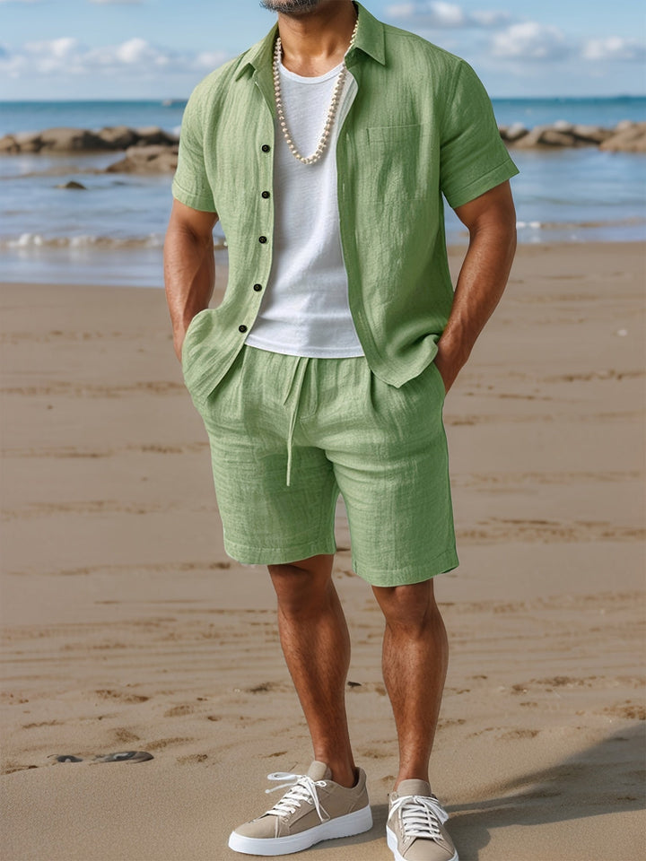 Comfortable men's summer clothing set: short sleeve linen shirt and easy-fit shorts for warm days.