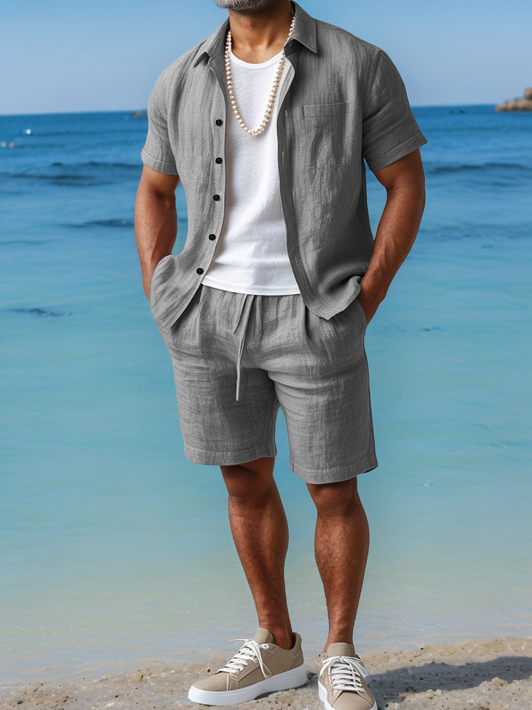 Men's casual summer set with a button-up short sleeve shirt and comfortable drawstring shorts.