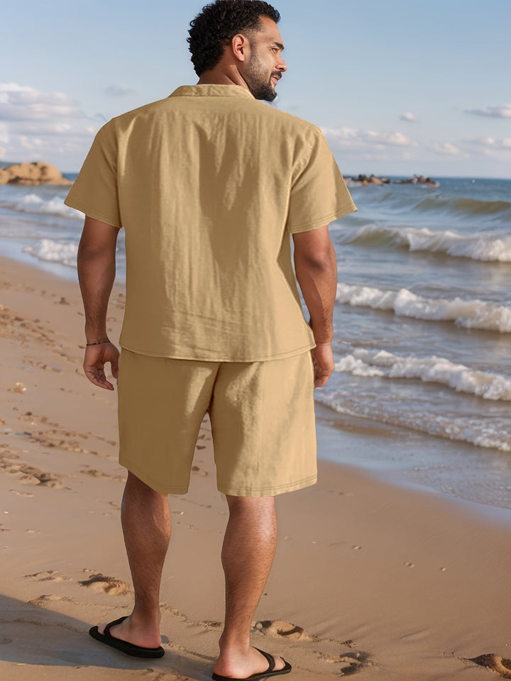 Lightweight men's linen summer set: relaxed fit short sleeve shirt & elastic waist shorts for comfort.