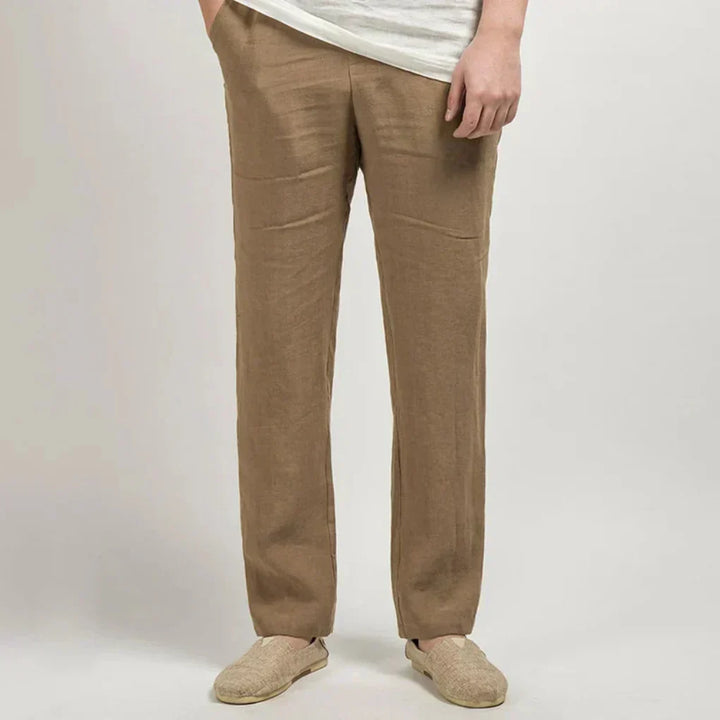 Close-up of men's breathable linen trousers, showcasing lightweight fabric and relaxed fit for comfort.