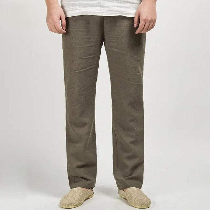 Men's versatile straight leg linen pants styled for smart casual summer fashion.