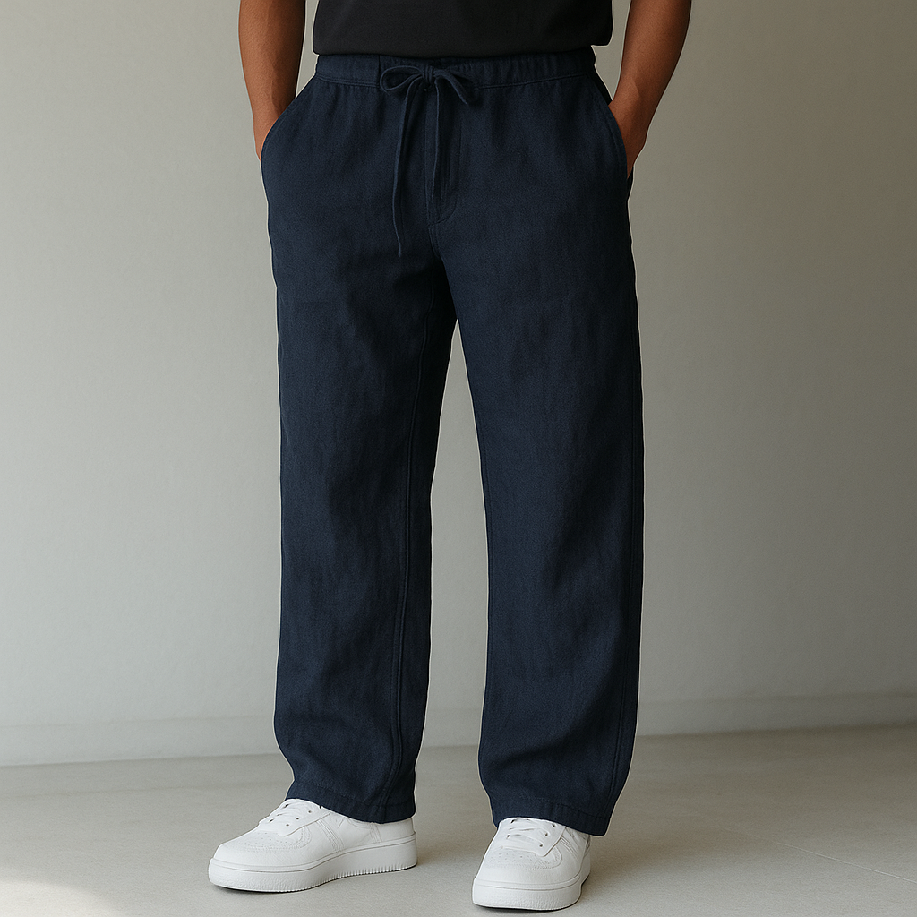 Men's relaxed fit linen trousers with drawstring waist for ultimate comfort & warm weather style.