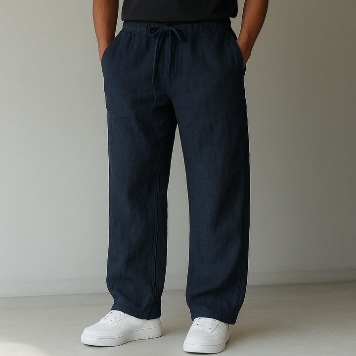 Men's relaxed fit linen trousers with drawstring waist for ultimate comfort & warm weather style.