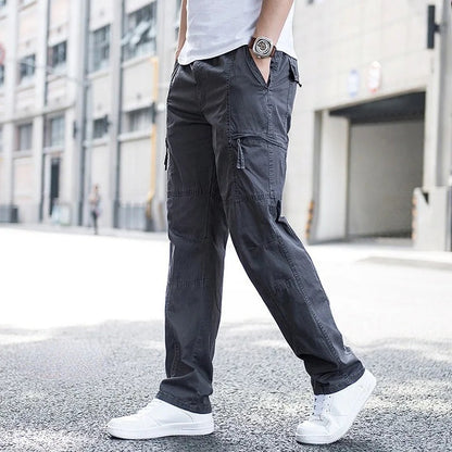 Collection of men's organic cotton cargo pants: khaki, black, gray on white background