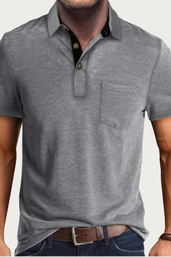 Men's short sleeve polo shirt featuring a relaxed fit, contrasting collar, button placket & convenient chest pocket.
