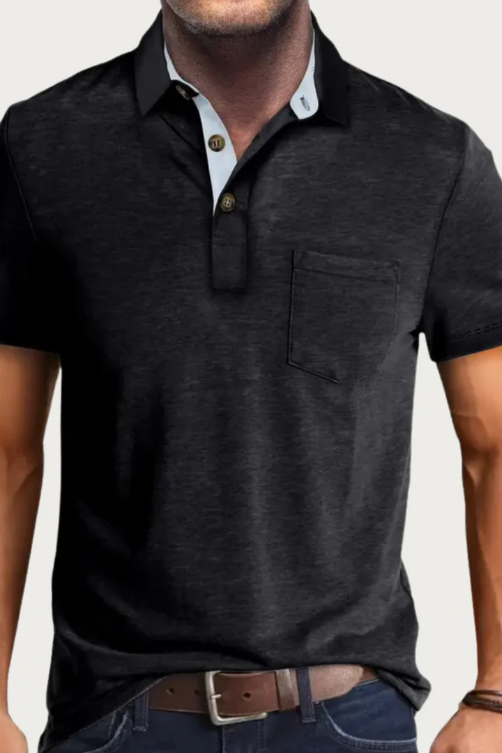 Relaxed fit men's short sleeve polo shirt with a stylish contrast collar, button placket, and chest pocket.