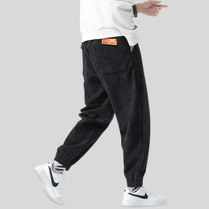 New men's fashion: Gray corduroy joggers with relaxed wide leg, ideal for casual wear.
