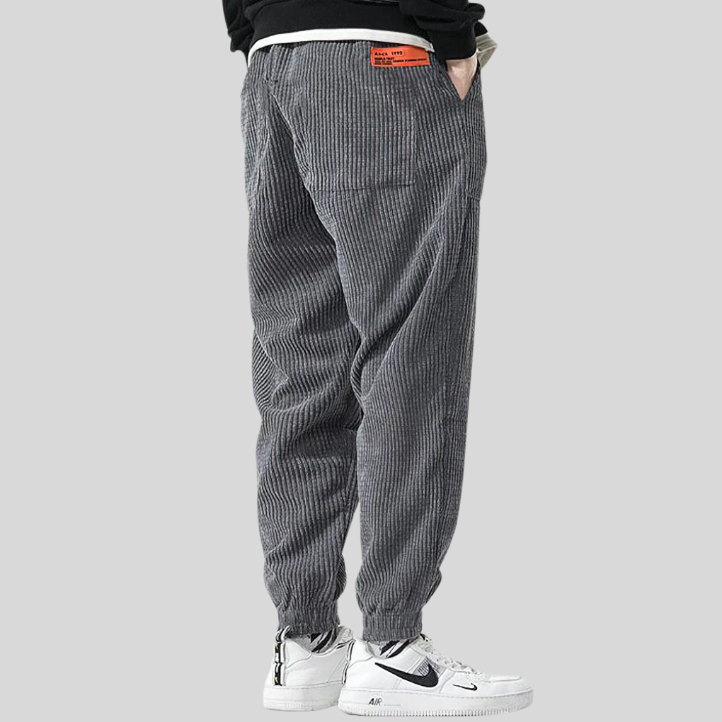 Men's relaxed fit gray corduroy joggers, showcasing the unique texture of corduroy pants.