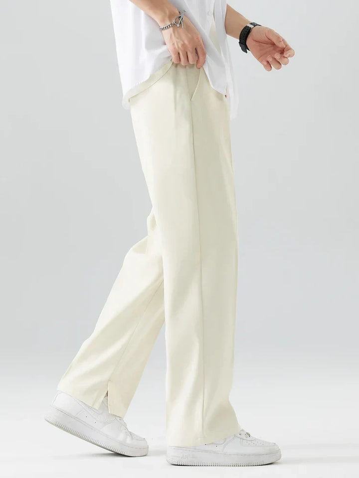 Comfortable white wide leg pants for men, featuring a relaxed fit, ideal for summer wear