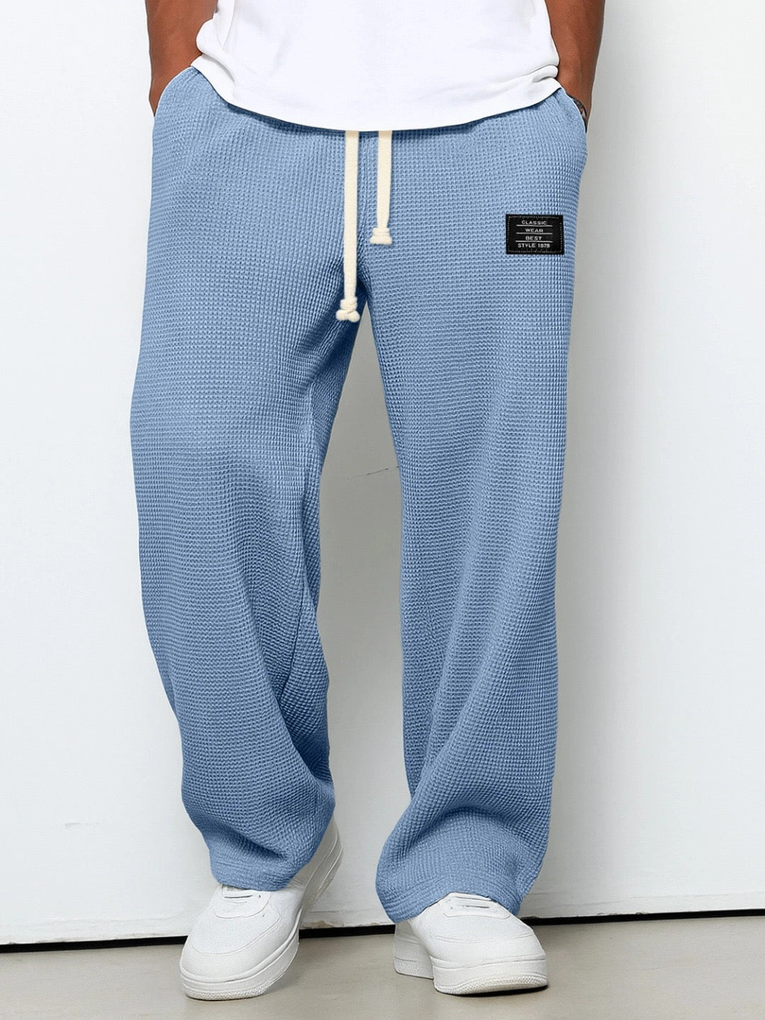 Men's relaxed fit wide leg sweatpants with adjustable waist, comfortable loungewear