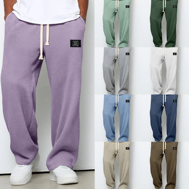 Men's wide leg sweatpants in a neutral color, versatile and comfortable for casual wear