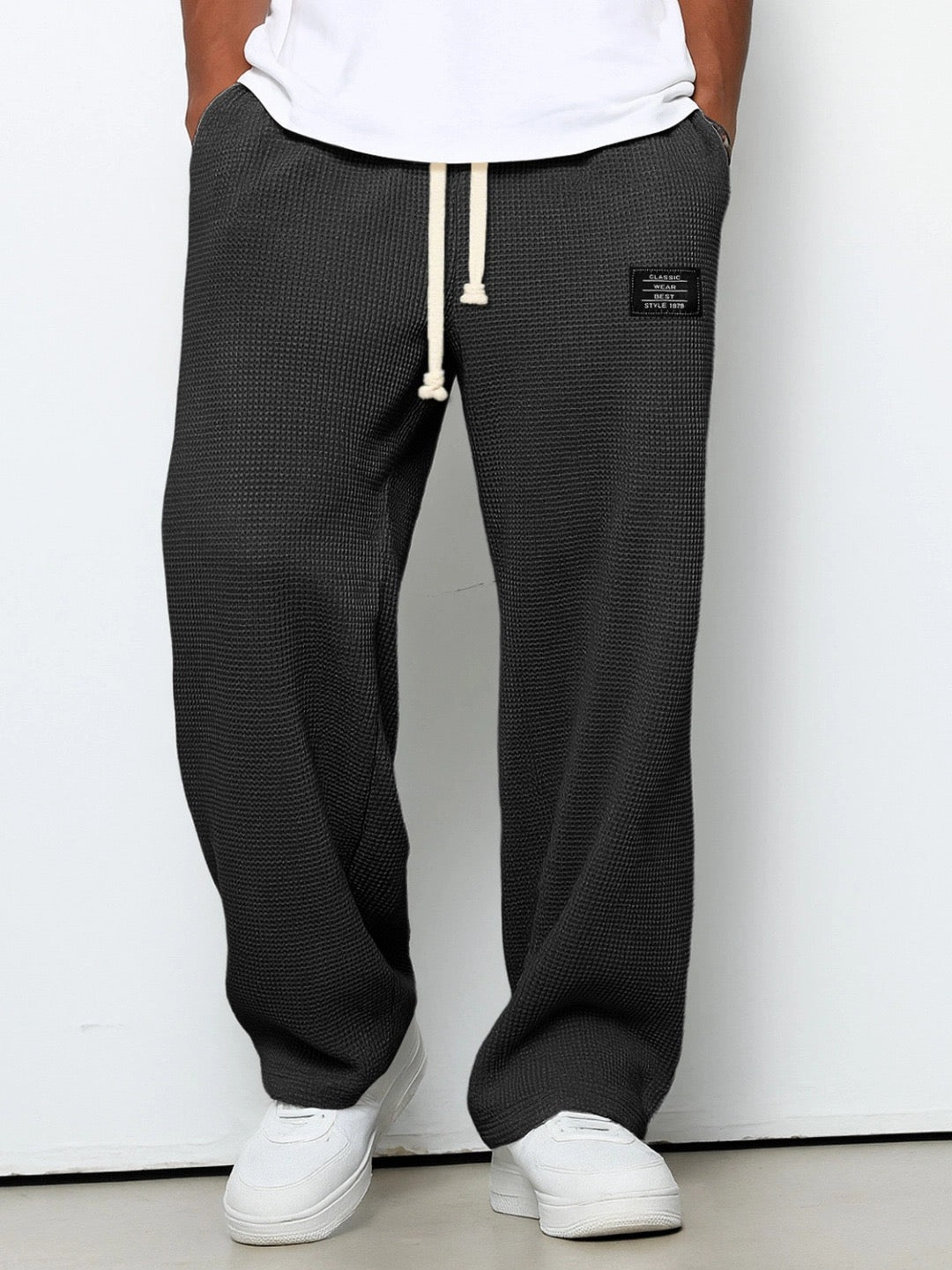 Men's casual wide leg sweatpants paired with a hoodie, comfortable loungewear attire