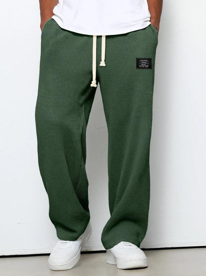 Fashionable men's wide leg sweatpants, perfect for streetwear style and winter comfort