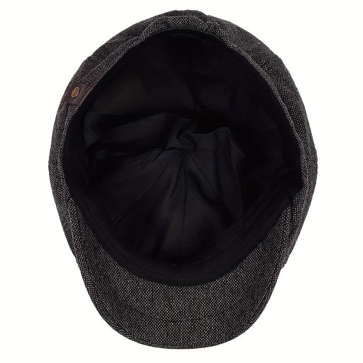 Versatile men's retro flat cap, herringbone, a classic vintage fashion statement.