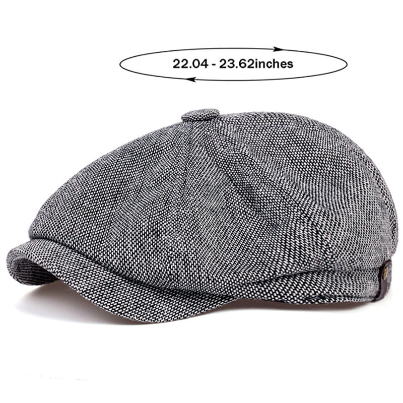Close-up of men's retro flat cap showing detailed herringbone pattern, vintage.