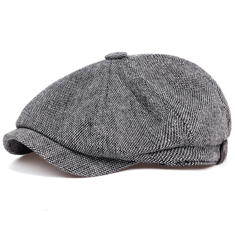 Classic men's Gatsby cap, retro herringbone pattern, essential vintage fashion.