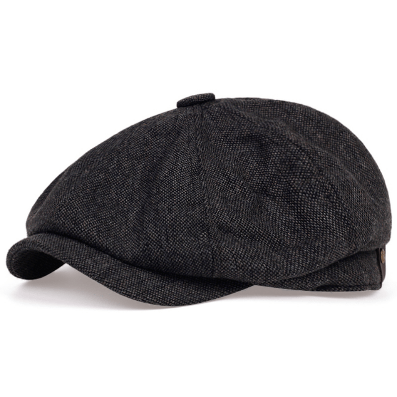 Stylish men's flat cap featuring a distinct herringbone pattern, classic headwear.