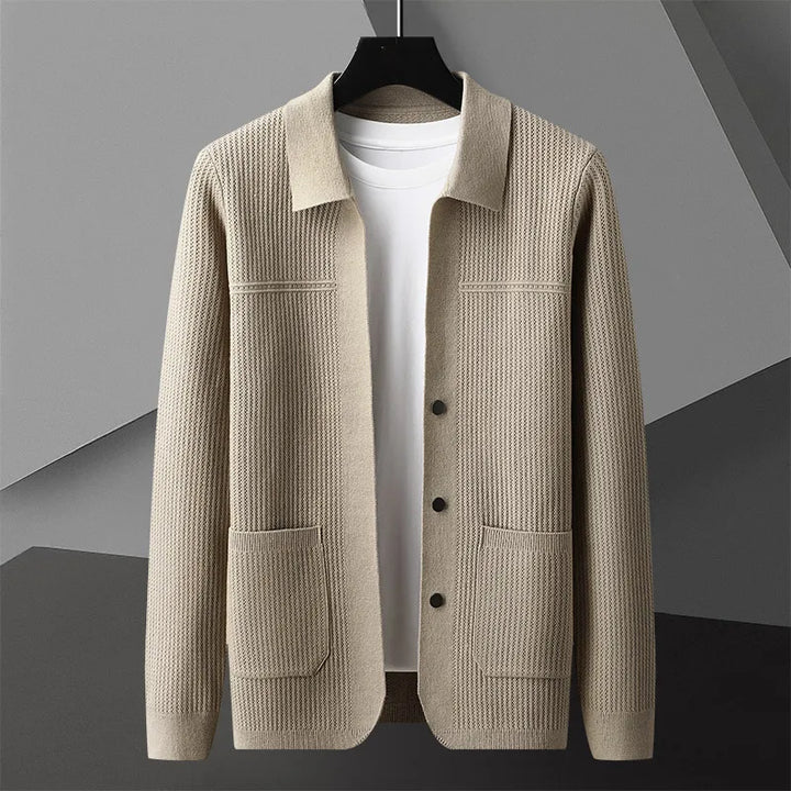 Textured ribbed knit men's cardigan with a smart collar & button closure. A stylish long sleeve casual layer.