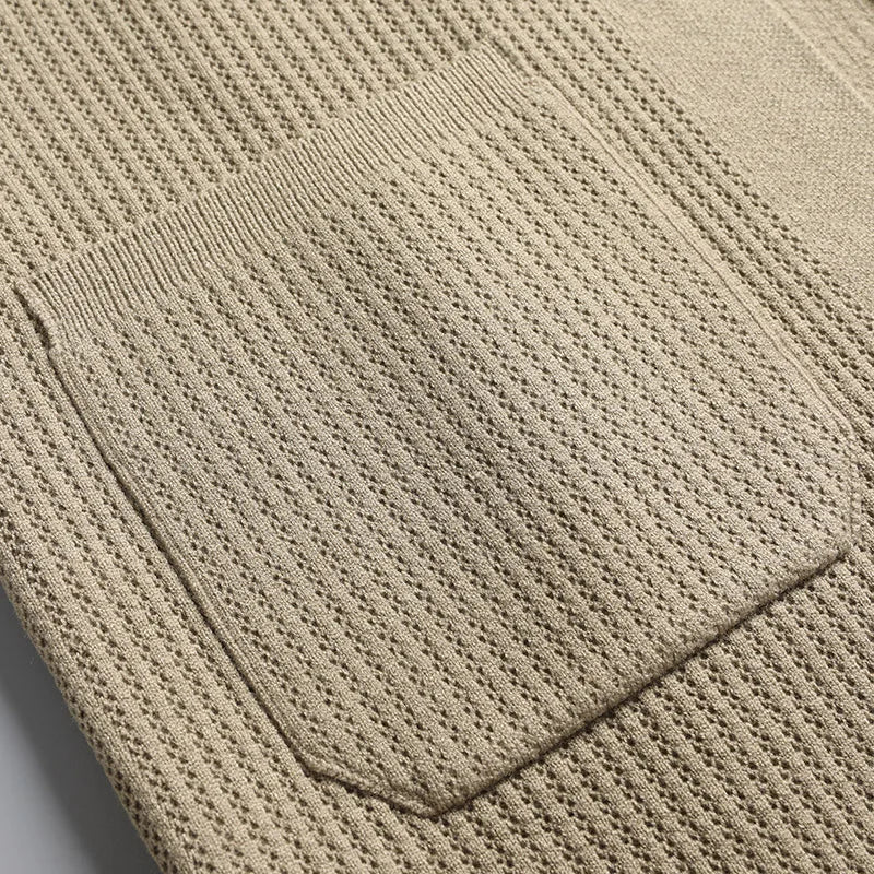 Modern men's ribbed collared cardigan, offering comfort & style. Button-front for a smart layered look.