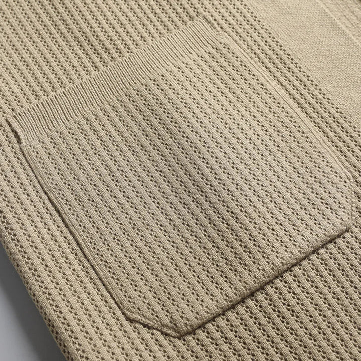 Modern men's ribbed collared cardigan, offering comfort & style. Button-front for a smart layered look.