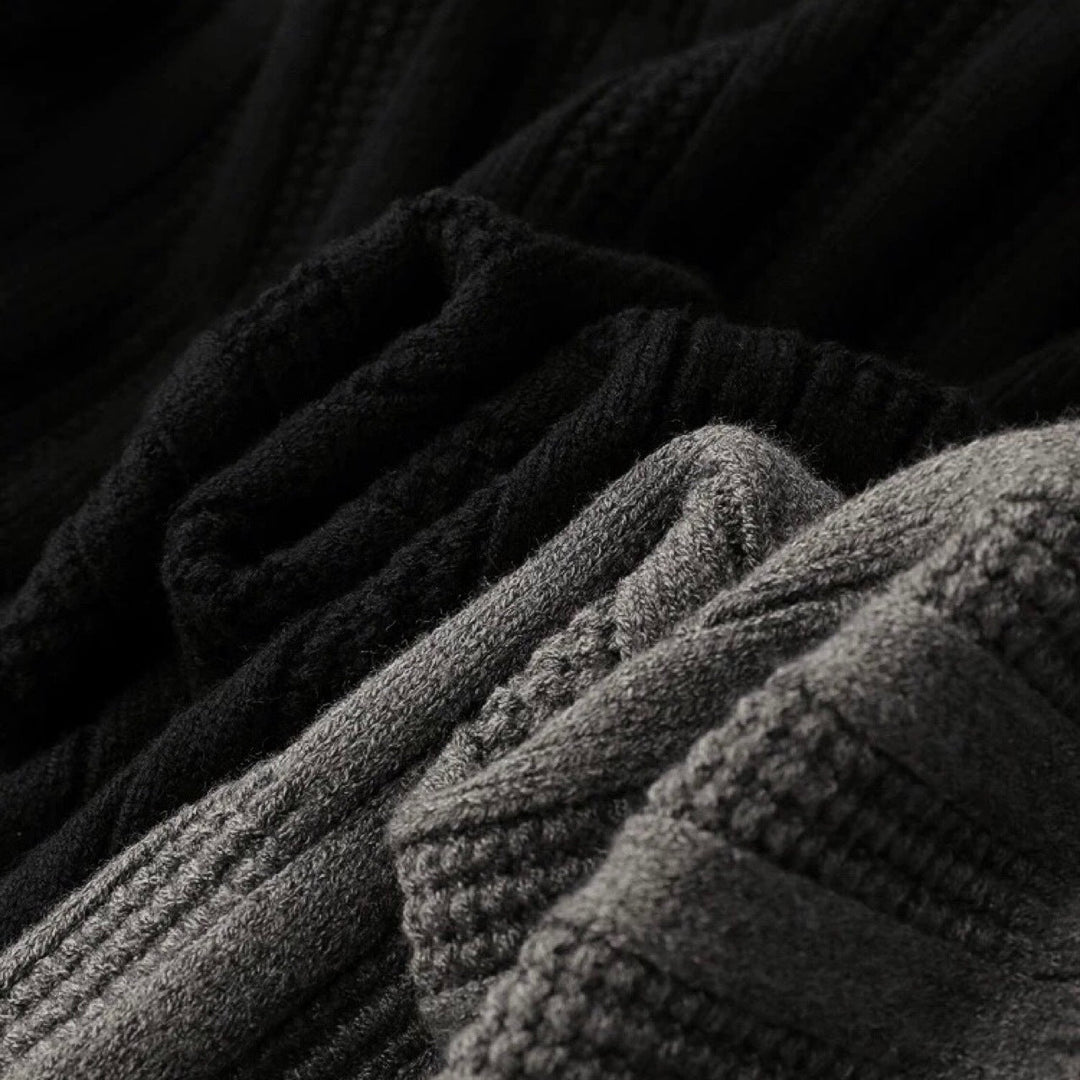 Ribbed knit men's sweater with a smart polo collar. Long sleeve, versatile for casual or smart casual looks.
