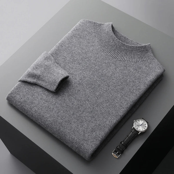 A classic men's mock neck sweater featuring a soft ribbed texture, offering both style and warmth for fall/winter.