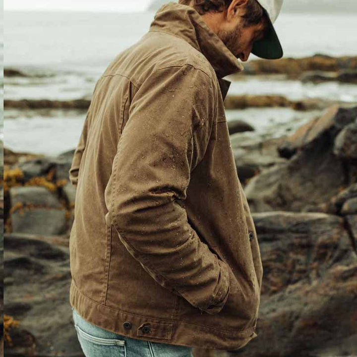 Practical men's autumn utility jacket in rugged brown. Versatile outerwear for fall adventures & winter.