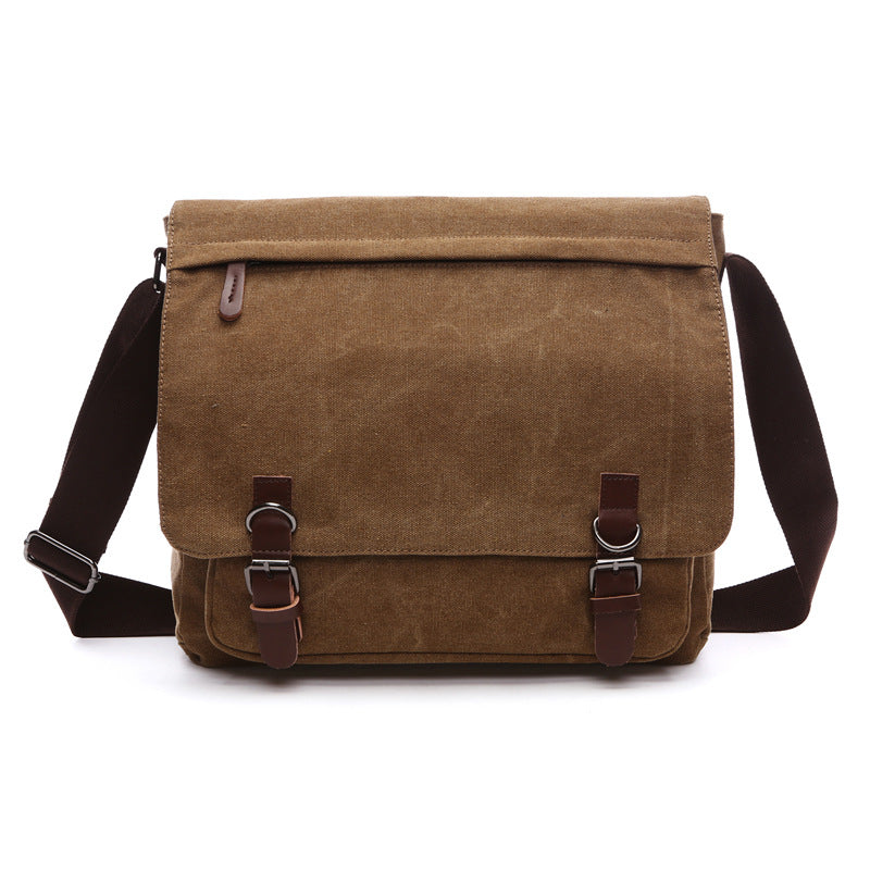 Unisex rugged canvas messenger bag, perfect for daily carry, showcasing its spacious main compartment