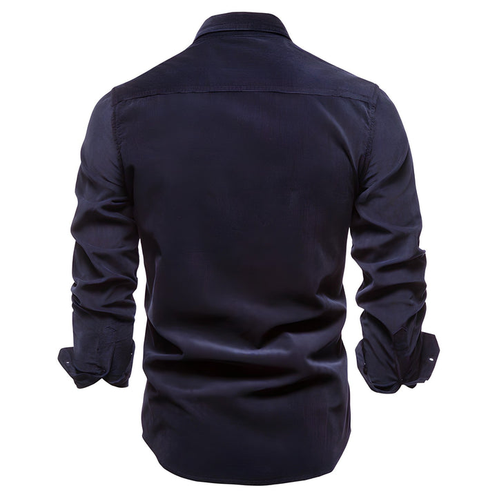 Stylish men's utility cargo long sleeve button-down shirt. Durable, comfortable, ideal for rugged outdoor fashion.