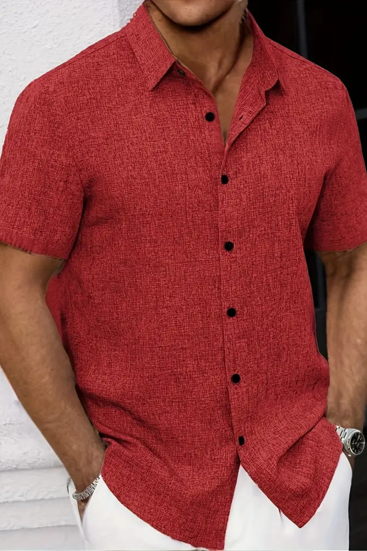Men's short sleeve button down summer shirt, showing textured fabric. Casual fit for warm weather.