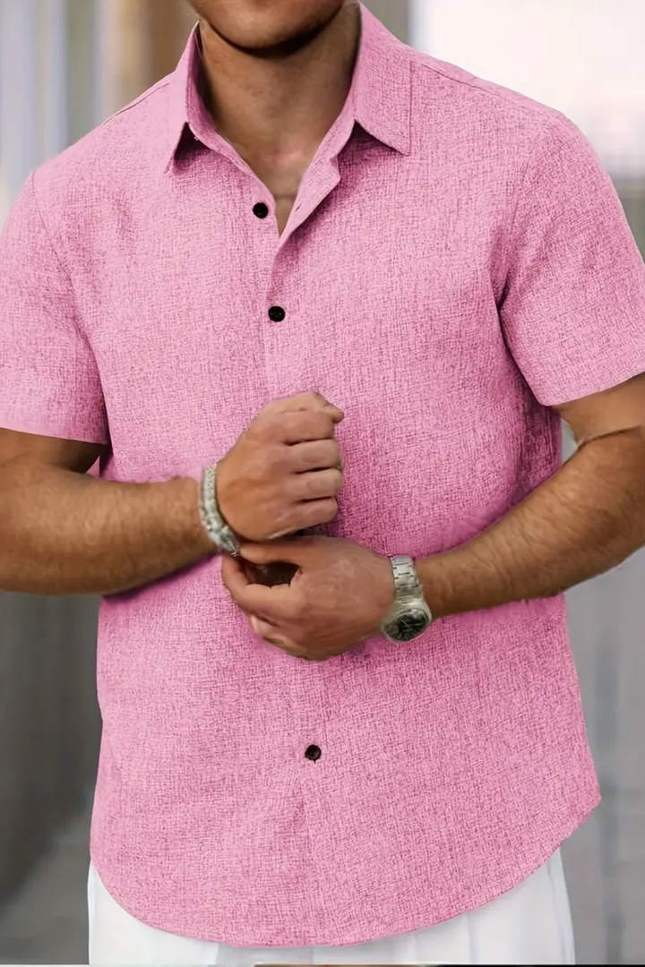 Trendy men's short sleeve button down summer shirt. Elevate your casual warm weather look.