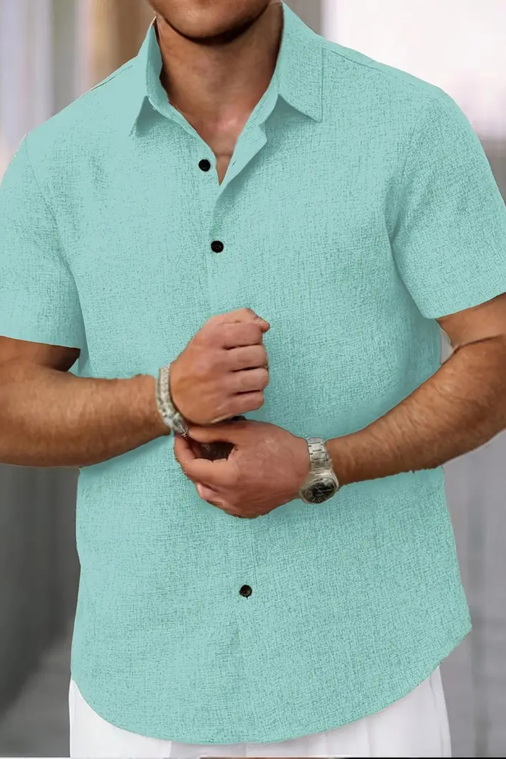Essential men's short sleeve button down summer shirt. Perfect for versatile casual style.