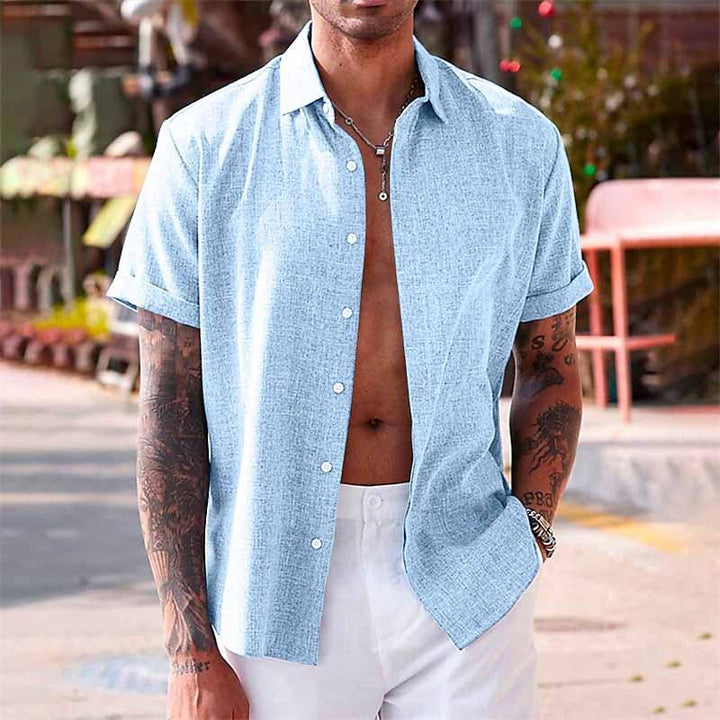 Casual men's short sleeve button front shirt. Summer vacation & beach outfit, relaxed fit for comfort.
