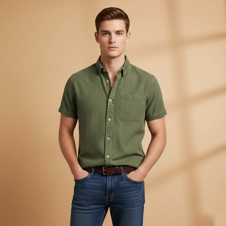 Stylish men's button-up, short sleeve shirt with chest pocket, perfect for warm weather casual style.