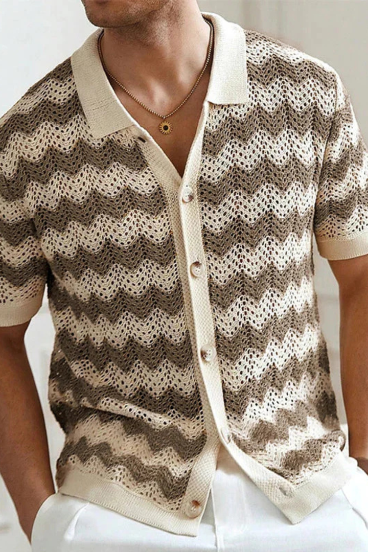 Trendy men's short sleeve polo featuring a unique zigzag pattern and button-up front. Perfect for summer.