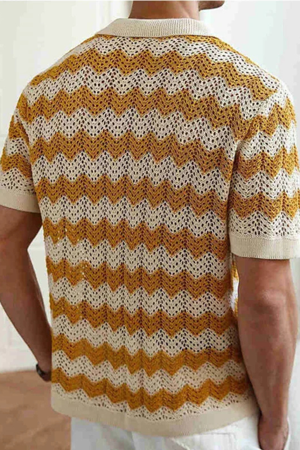 Casual men's short sleeve polo with a stylish zigzag pattern. Button front for a comfortable, unique summer look.