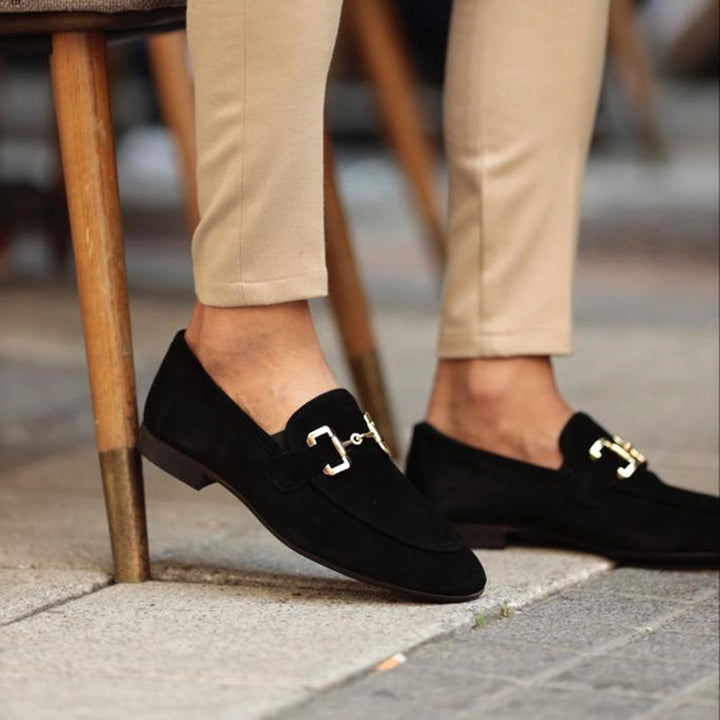 Refined men's leather slip-on horsebit loafers, perfect for sophisticated formal & casual outfits.