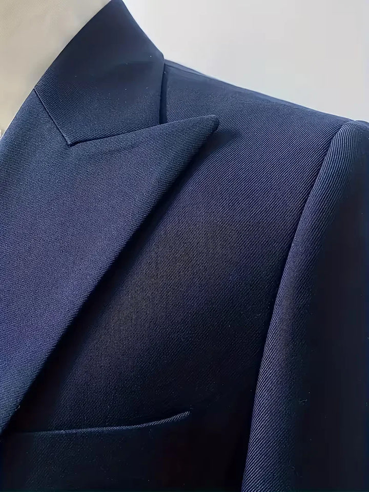 Men's occasion wear: slim fit 3-piece suit with a fashionable double-breasted waistcoat.