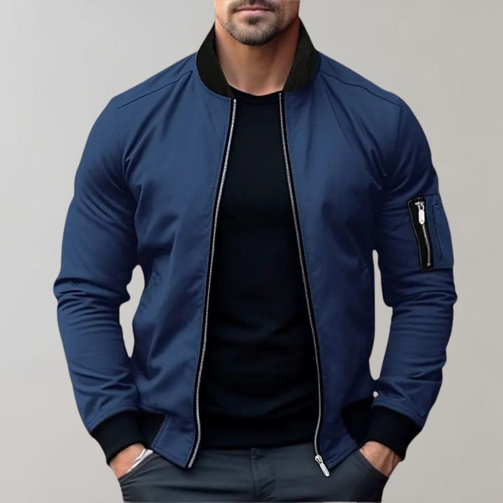 Men's slim fit black bomber jacket with full zip and chest pockets, ideal for casual outerwear.