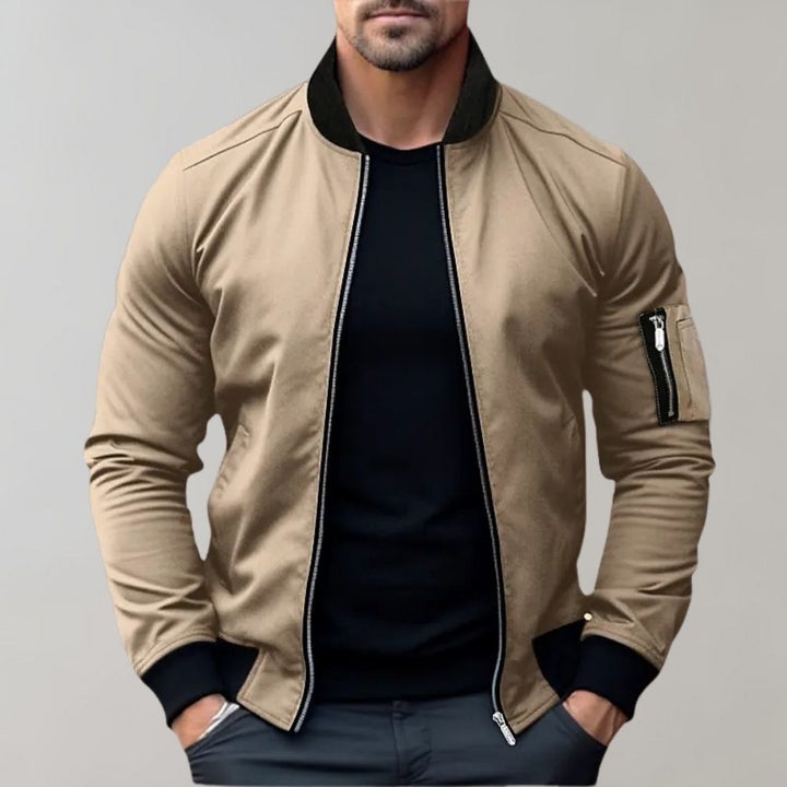 Fashionable men's zip-up bomber jacket in a slim fit, featuring side pockets for autumn style.