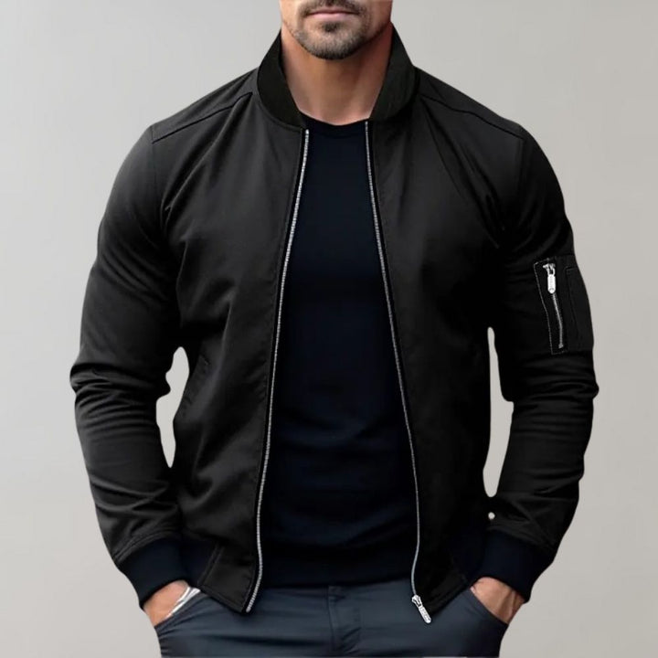 Lightweight men's bomber jacket with a front zipper and convenient hand pockets, perfect casual wear.