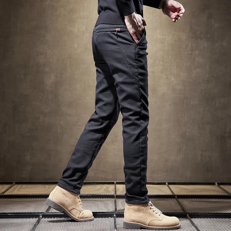 Close-up of the fabric texture on men's slim-fit casual chino pants, highlighting quality and comfort.